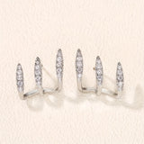 Elegantne naušnice sa tri kandže ukrašene draguljima