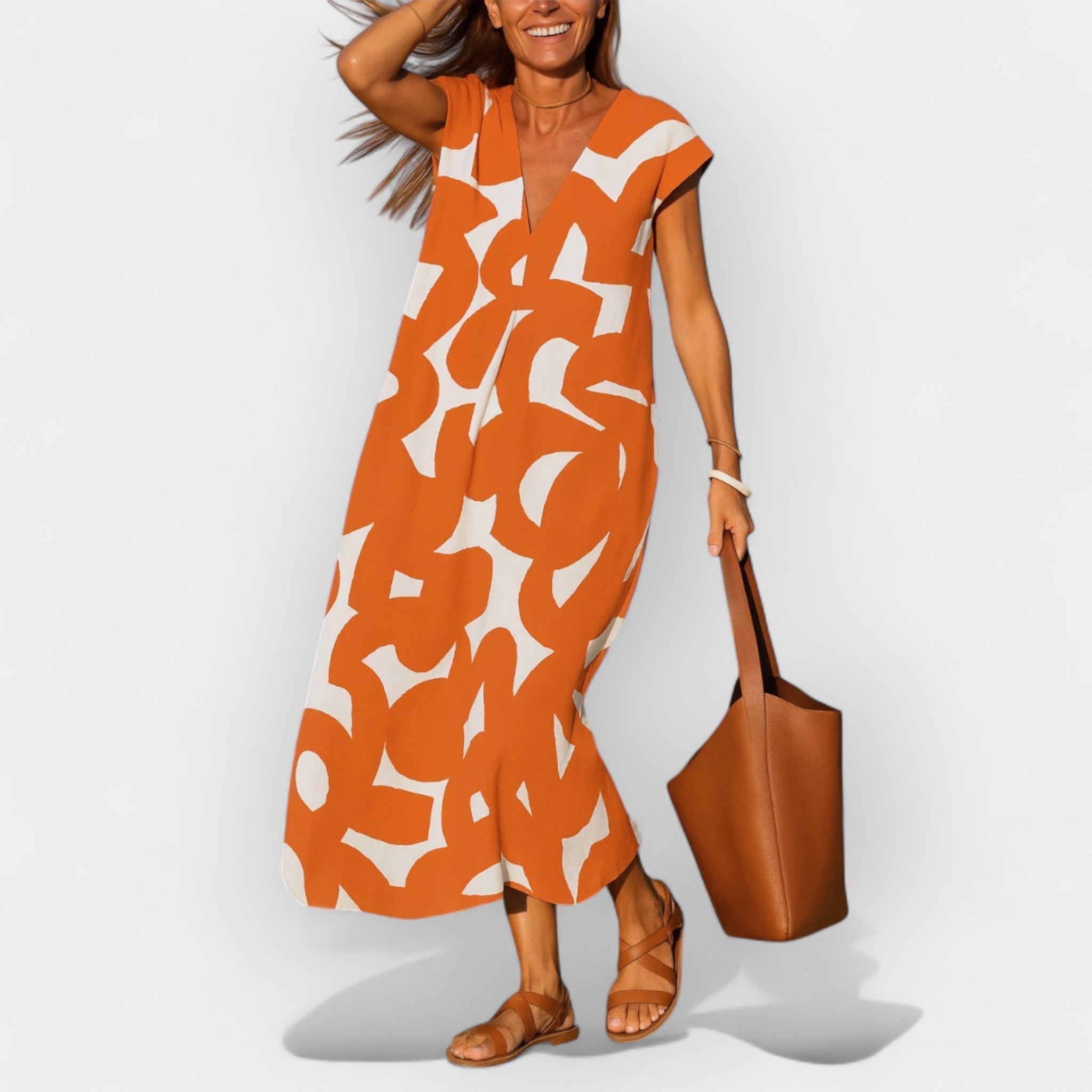 Hela – Elegantna zračna haljina s V izrezom