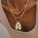 Elegantna zlatna ogrlica sa inicijalima