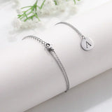 Elegantna zlatna ogrlica sa slovnim privjeskom