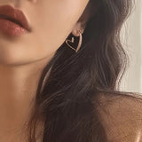 Elegantne naušnice u obliku srca od roze zlata