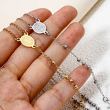 Ogrlica od nerđajućeg čelika sa krunicom